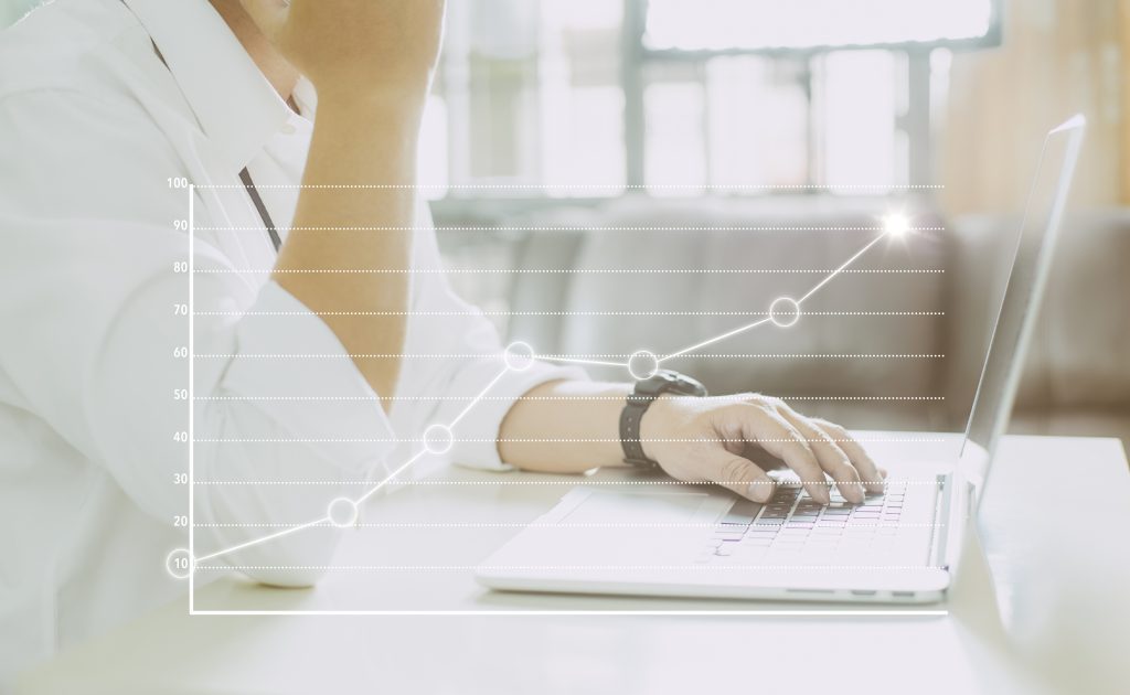 graphicstock businessman using laptop graph statistical analysis business success concept